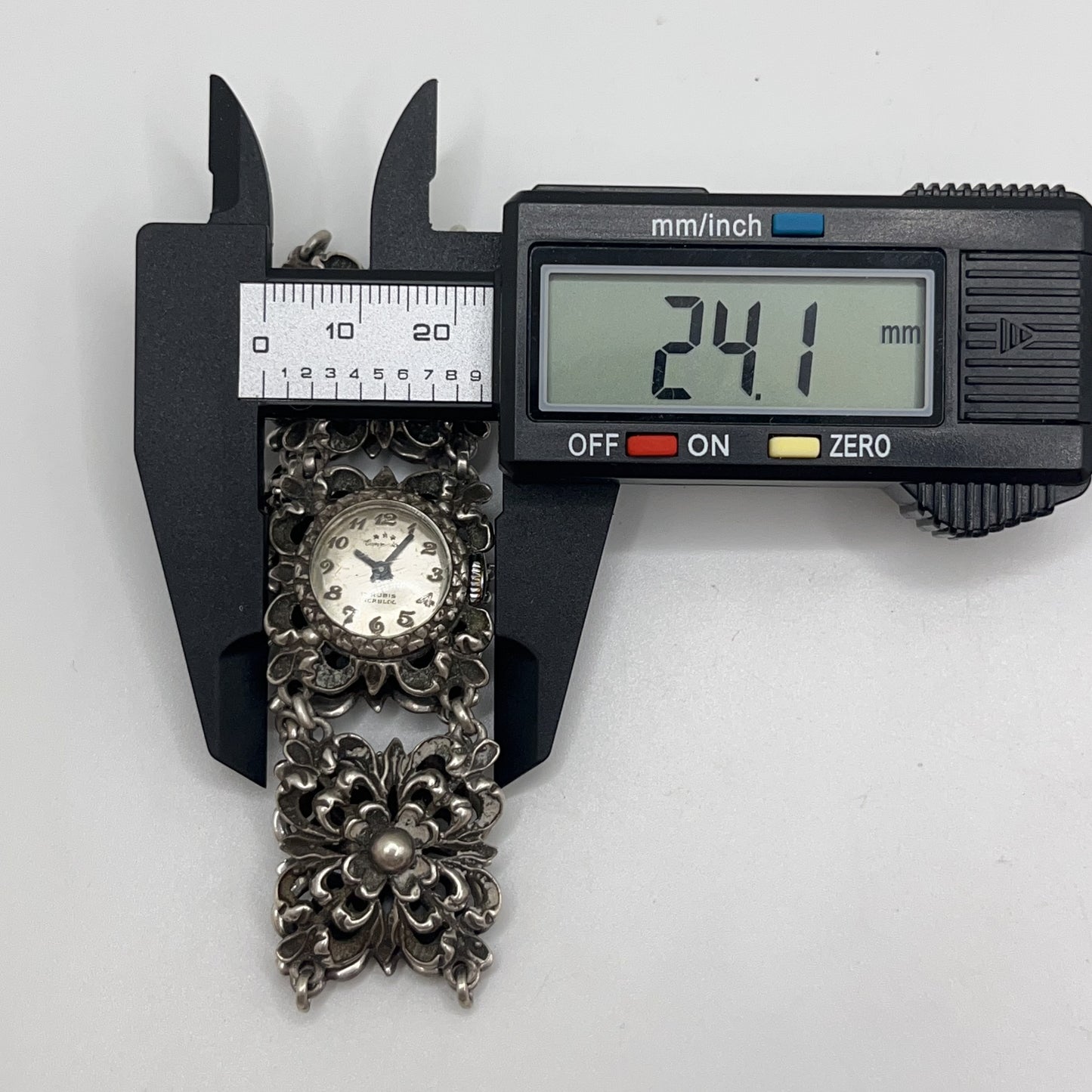 Vintage . Handmade Watch in Silver 800 with Floral Sculpture Belt. Manual