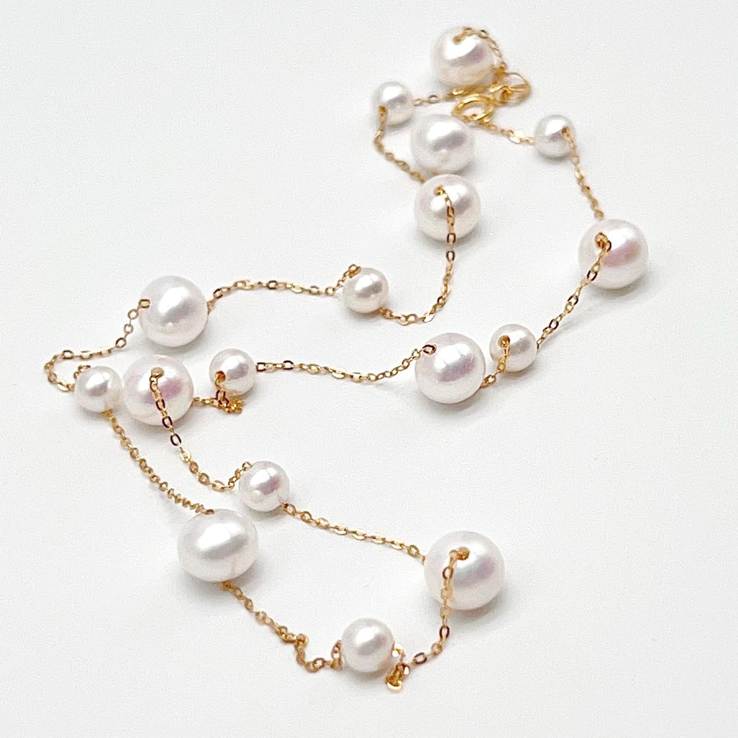 Starlight. 4-7mmWhite Pearl Necklace in 18K Gold