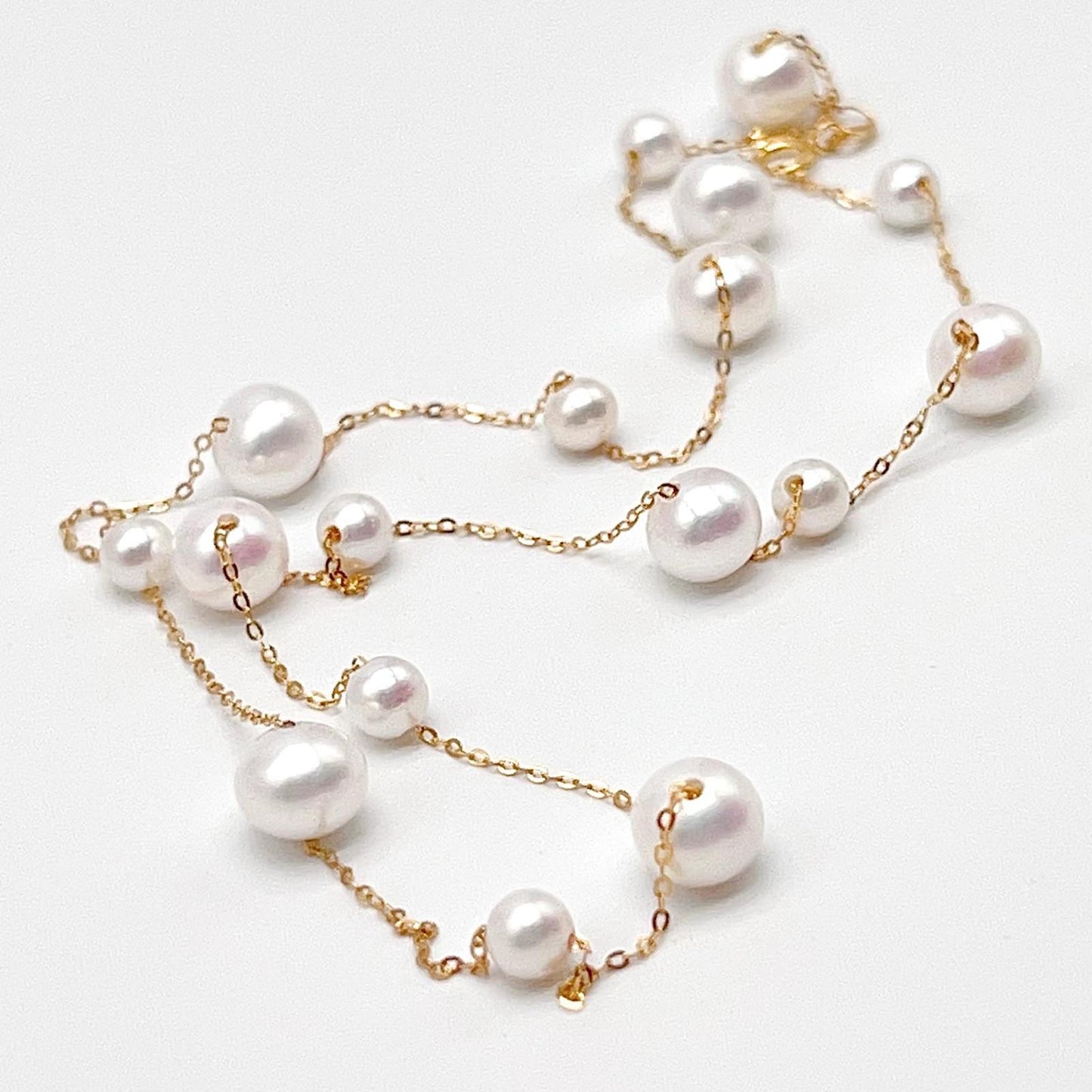Starlight. 4-7mmWhite Pearl Necklace in 18K Gold