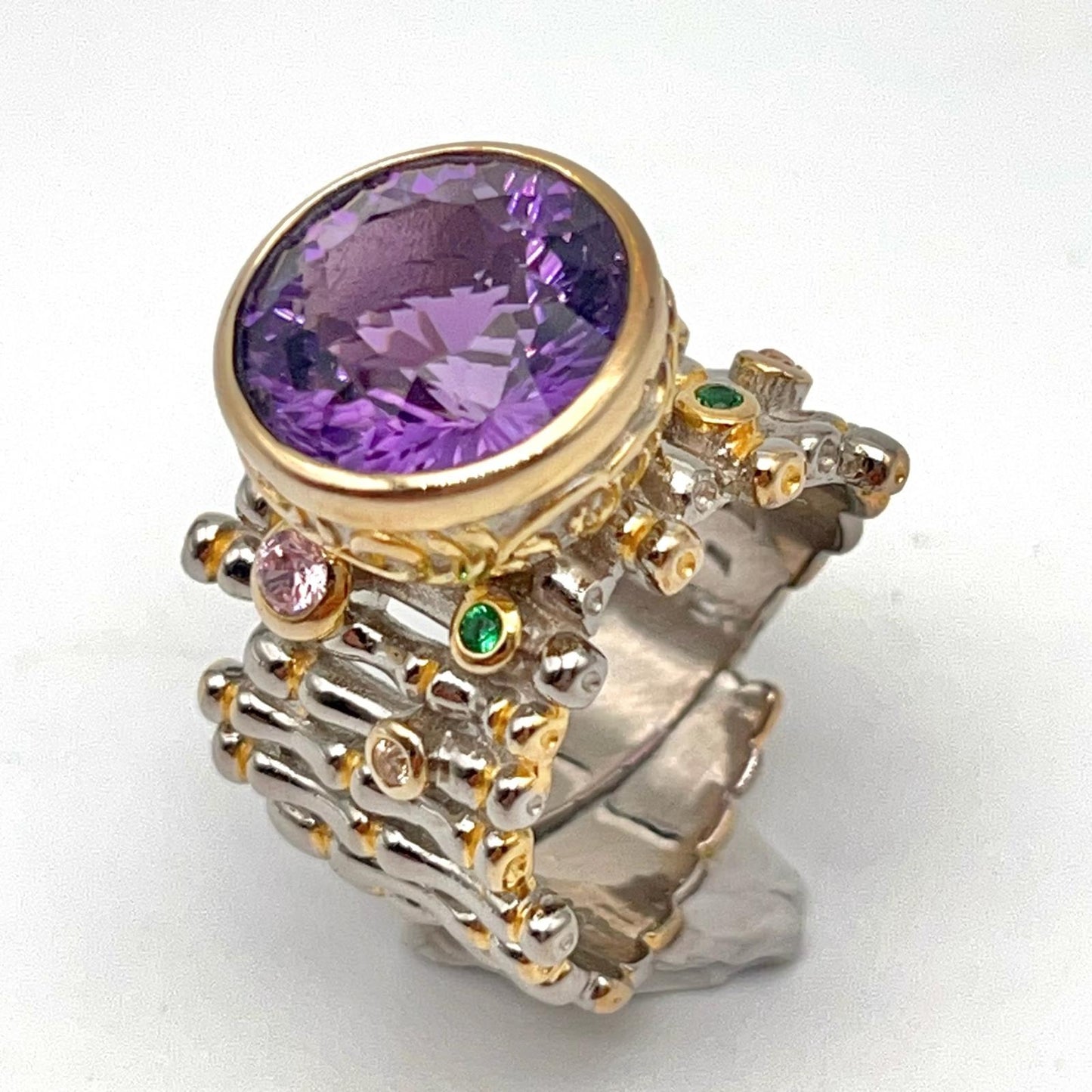 Retro Wind. Ring of Amethyst in Silver. Round Multi-color Zircon