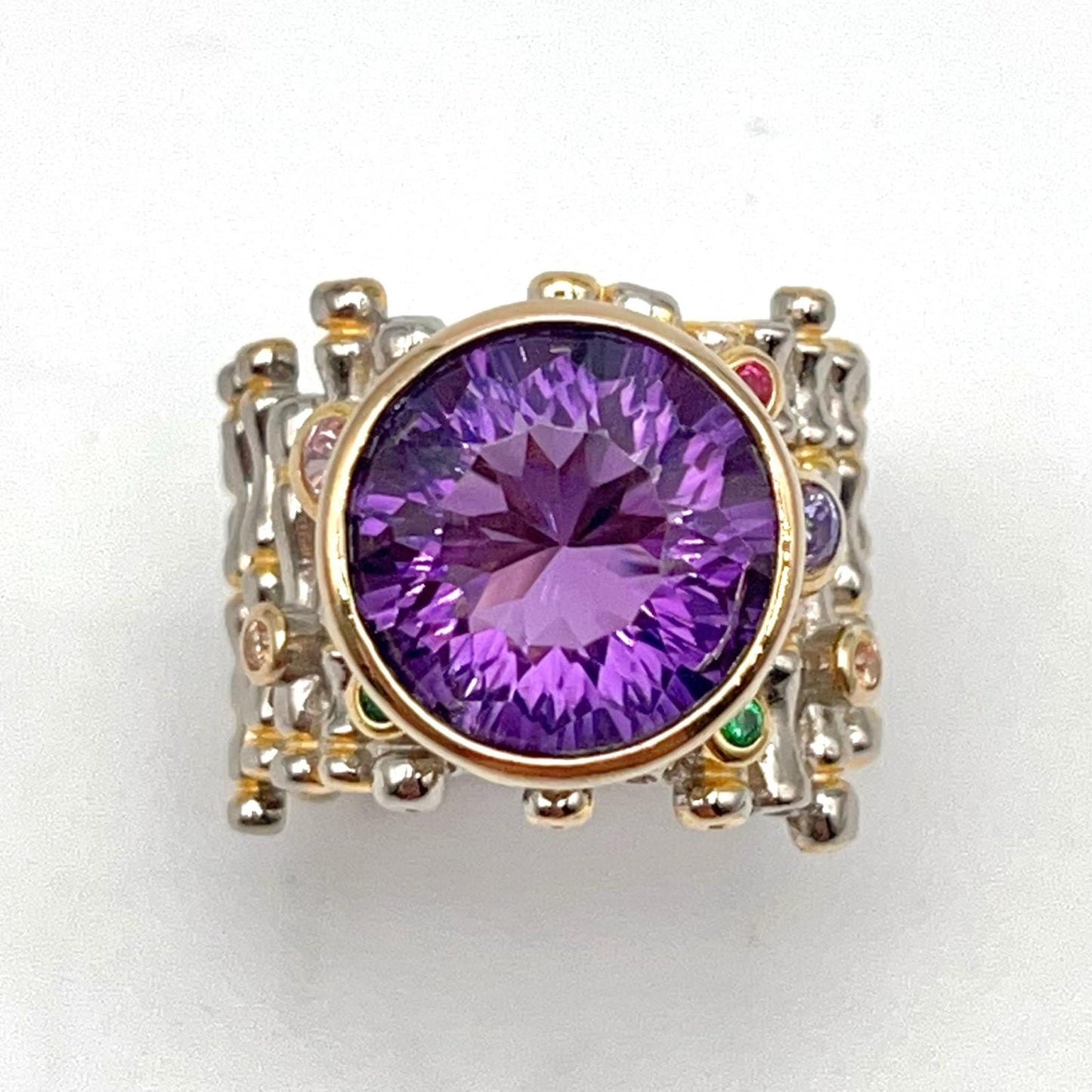 Retro Wind. Ring of Amethyst in Silver. Round Multi-color Zircon