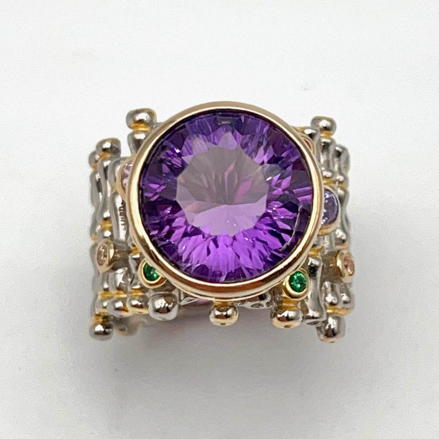 Retro Wind. Ring of Amethyst in Silver. Round Multi-color Zircon