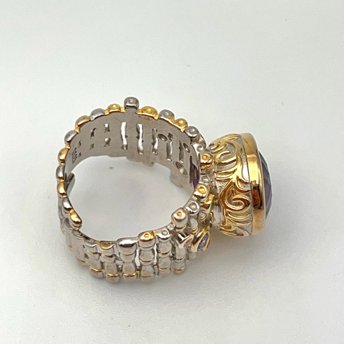 Retro Wind. Ring of Amethyst in Silver. Round Multi-color Zircon