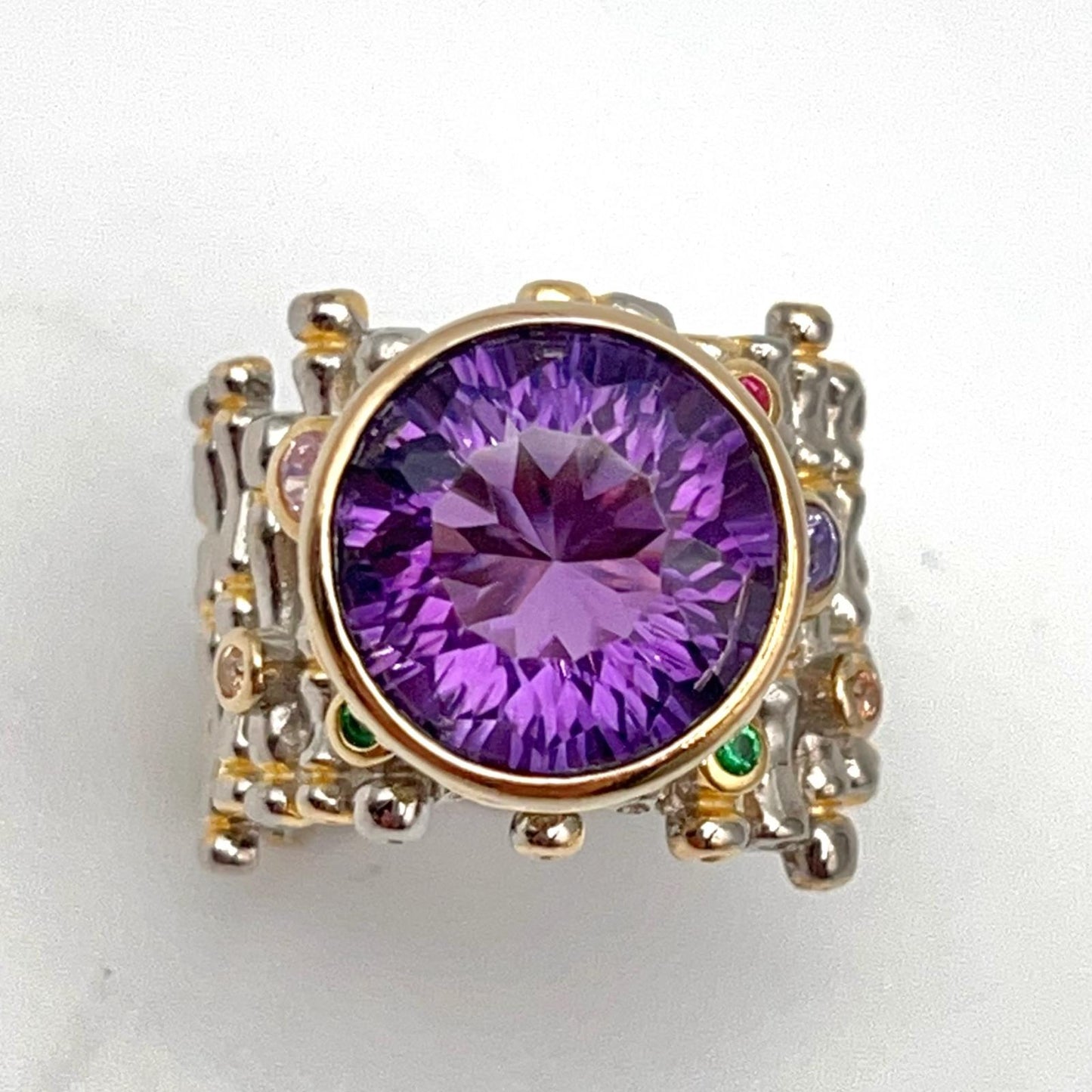 Retro Wind. Ring of Amethyst in Silver. Round Multi-color Zircon