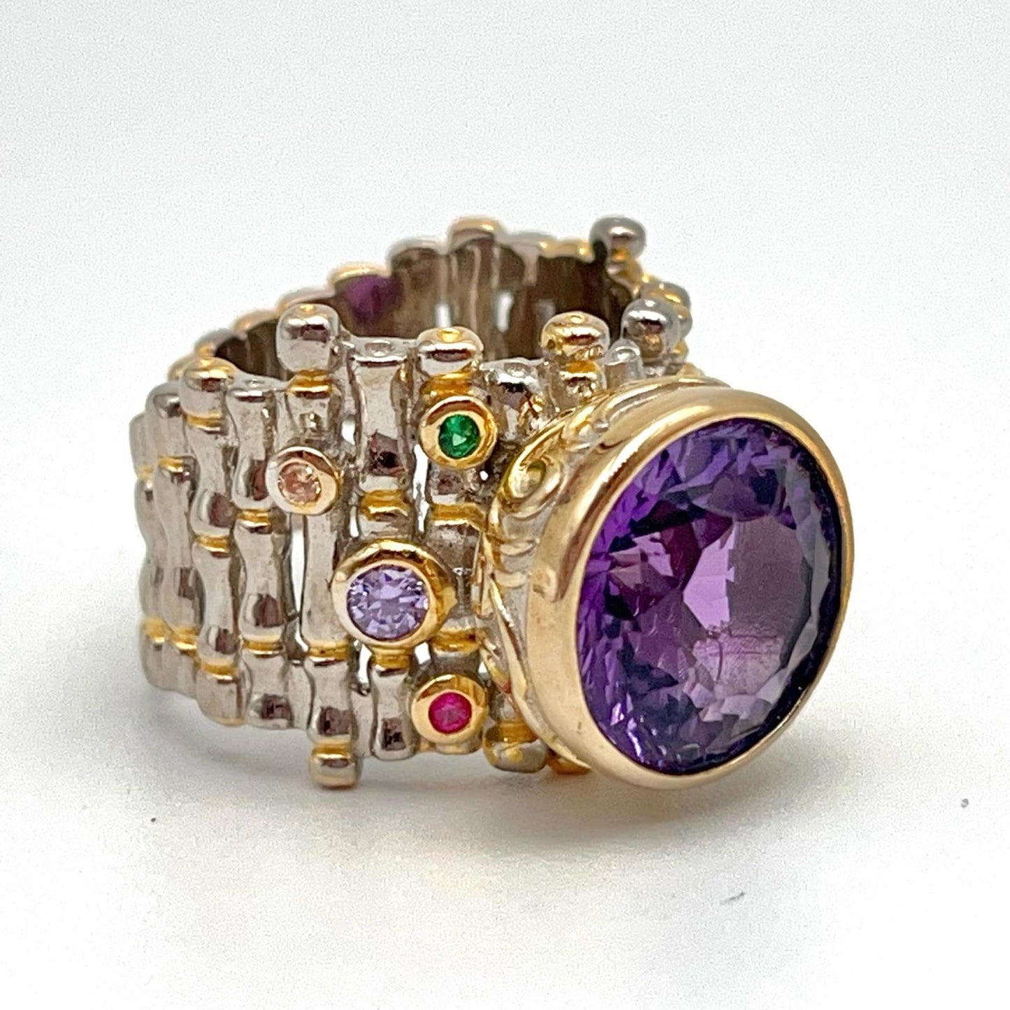 Retro Wind. Ring of Amethyst in Silver. Round Multi-color Zircon