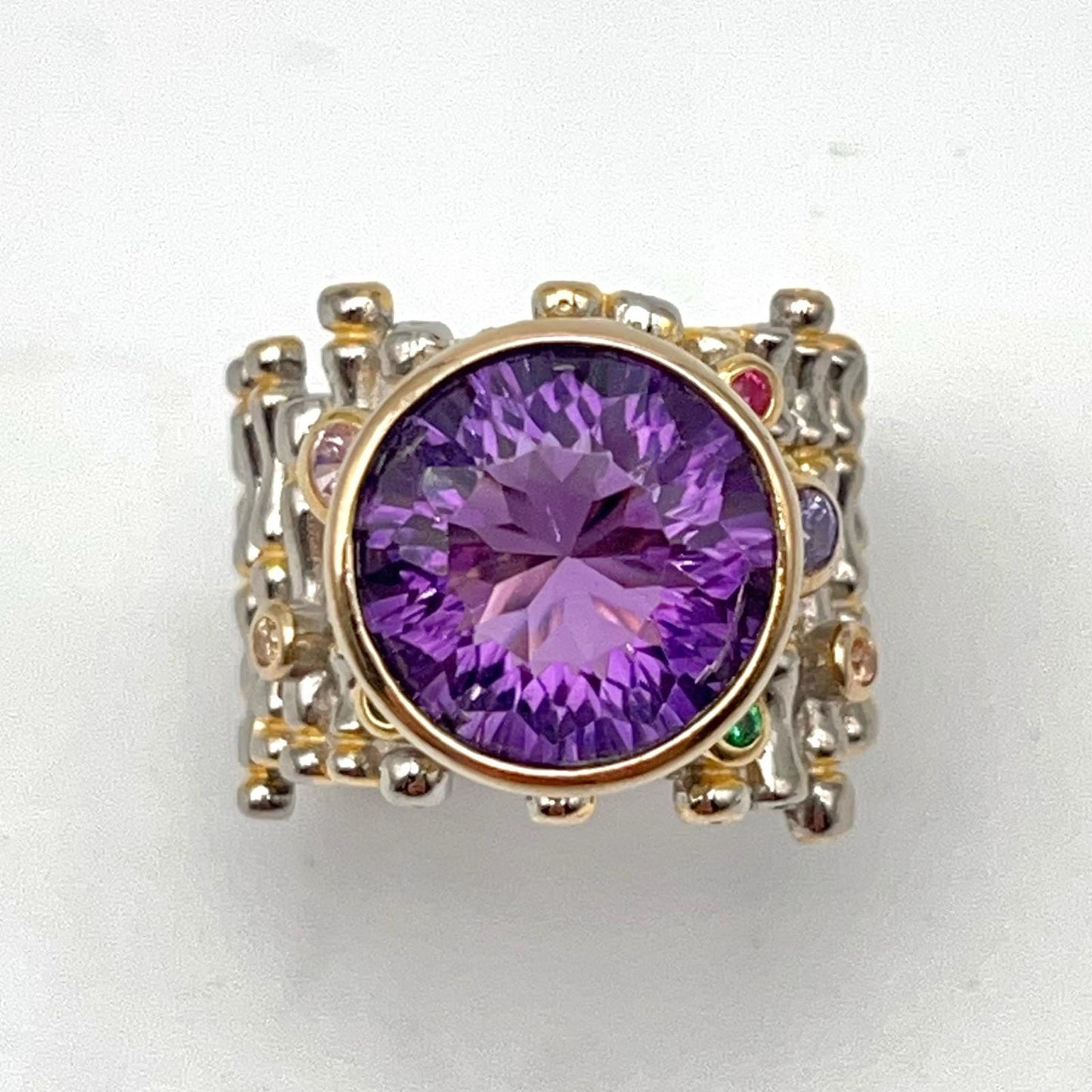 Retro Wind. Ring of Amethyst in Silver. Round Multi-color Zircon
