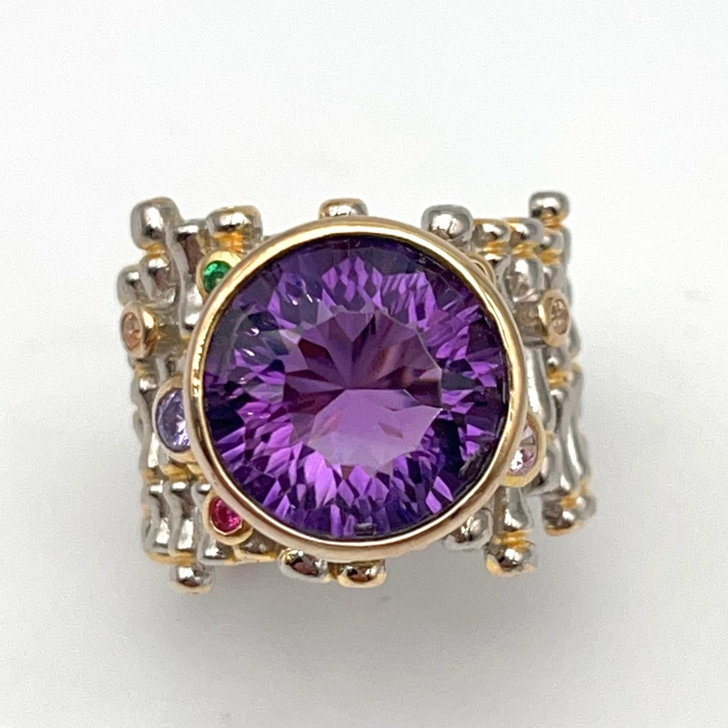 Retro Wind. Ring of Amethyst in Silver. Round Multi-color Zircon