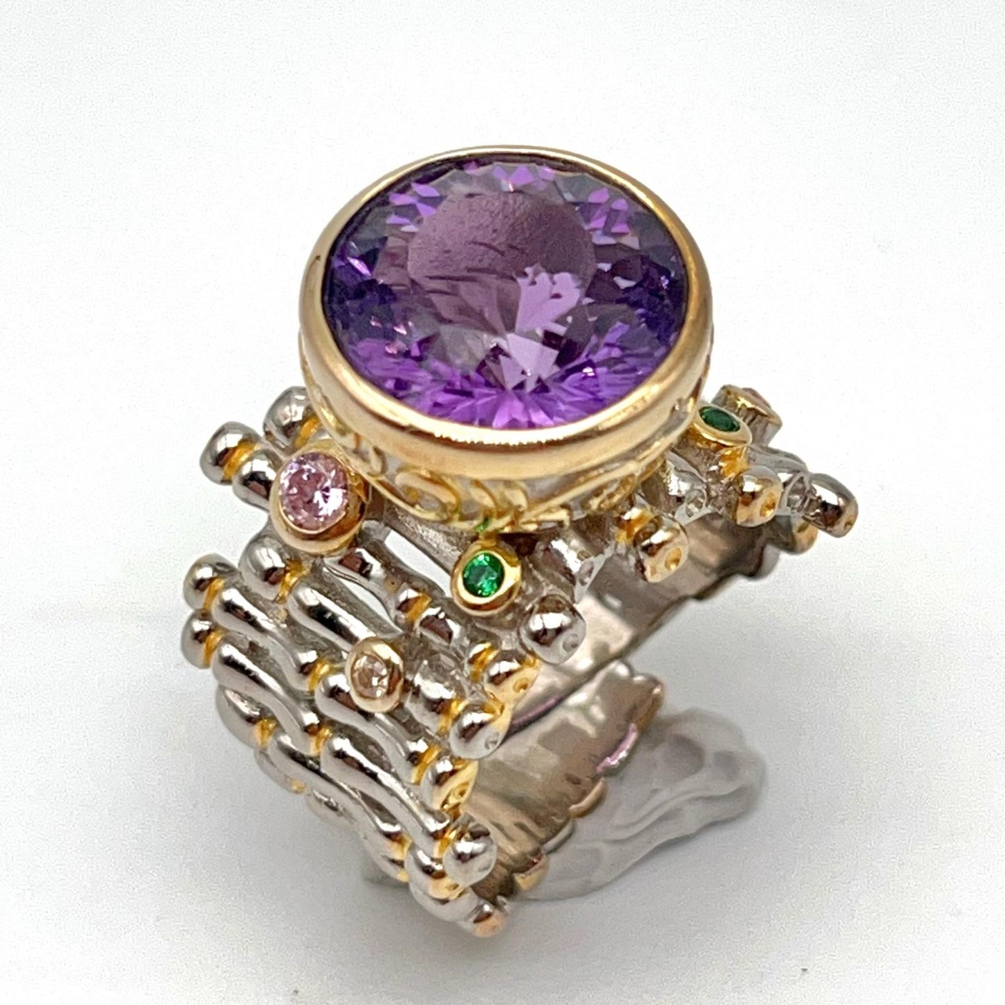 Retro Wind. Ring of Amethyst in Silver. Round Multi-color Zircon