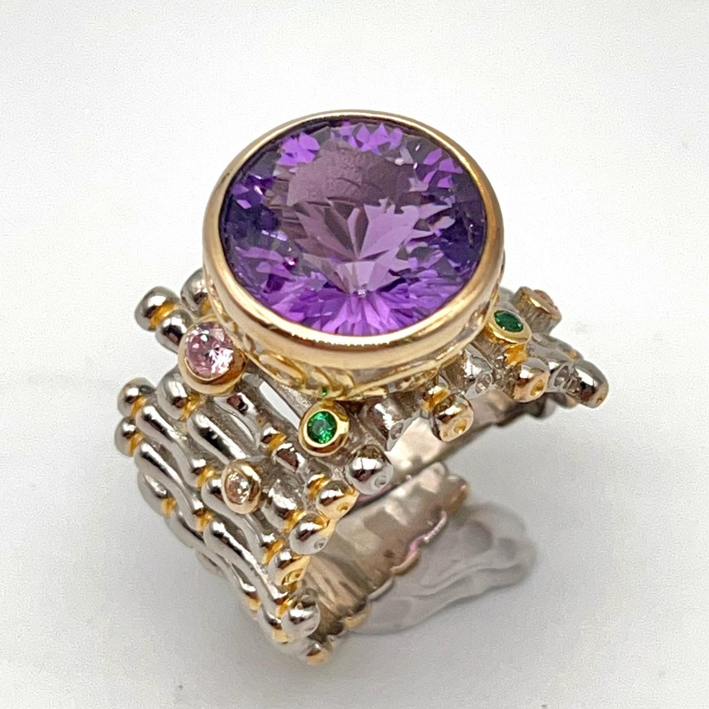 Retro Wind. Ring of Amethyst in Silver. Round Multi-color Zircon