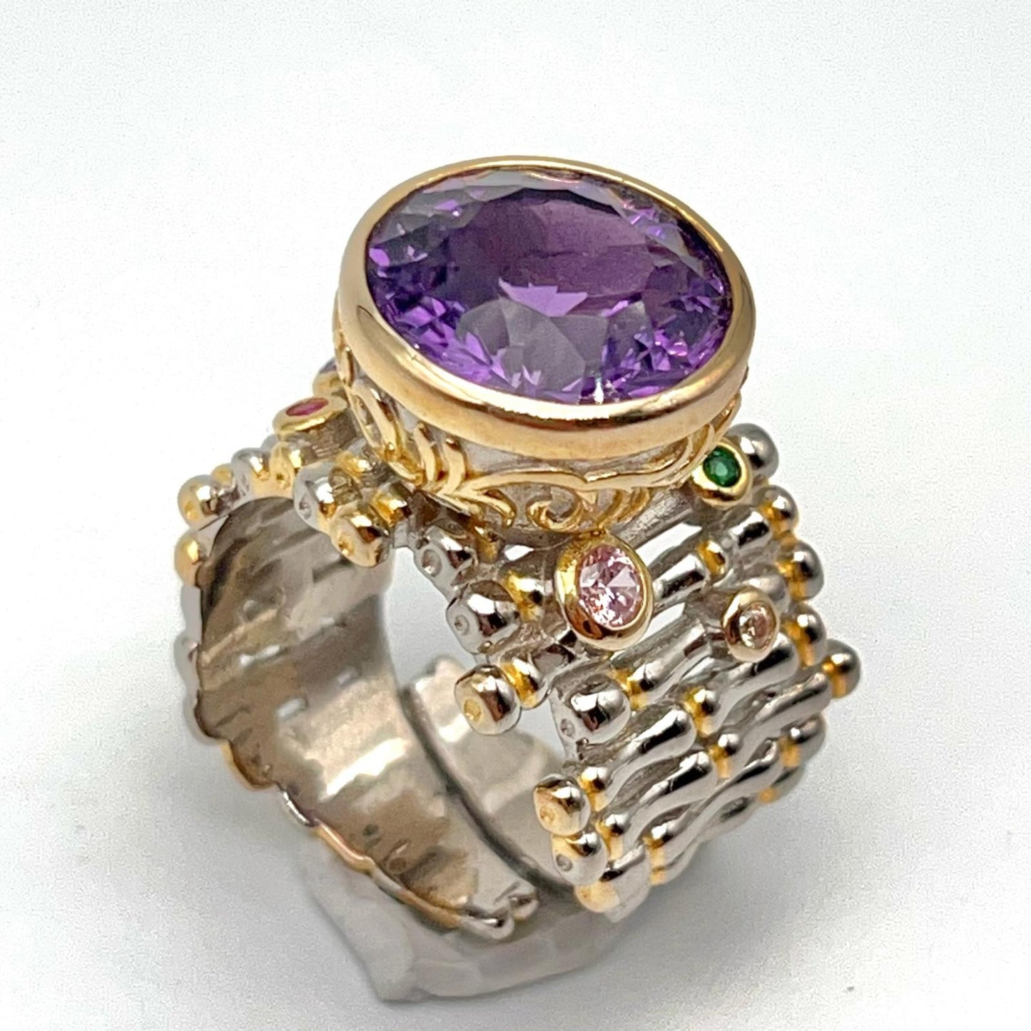 Retro Wind. Ring of Amethyst in Silver. Round Multi-color Zircon