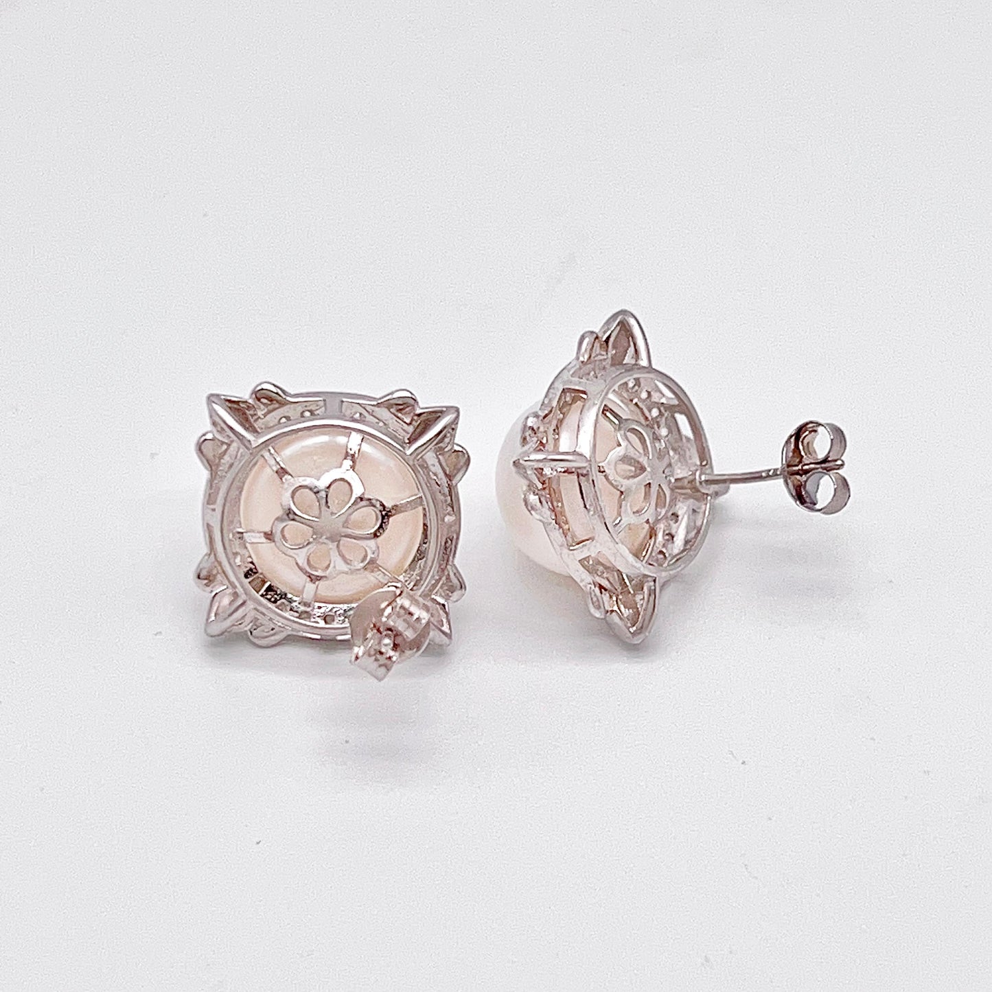 Retro Wind. Pearl Earring and Ring set in Silver 925. 4 Iris Frame