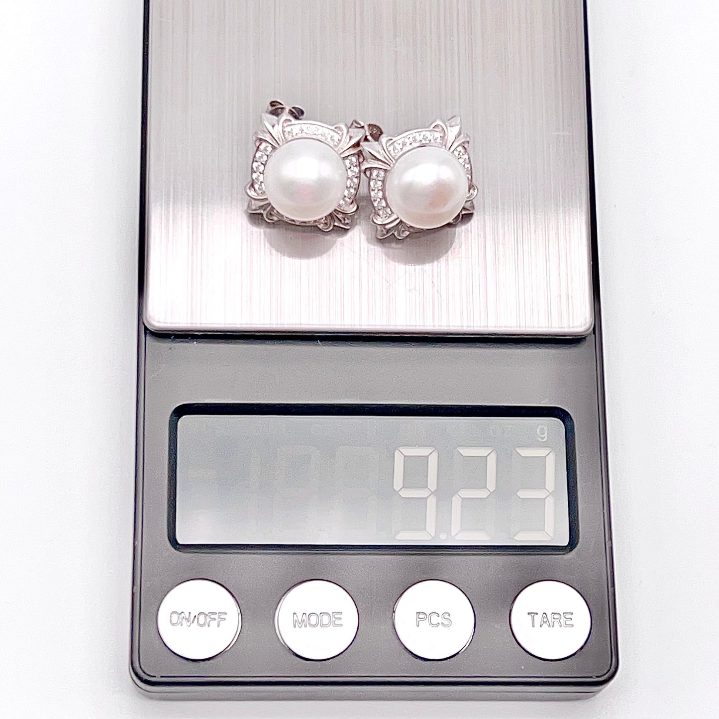 Retro Wind. Pearl Earring and Ring set in Silver 925. 4 Iris Frame