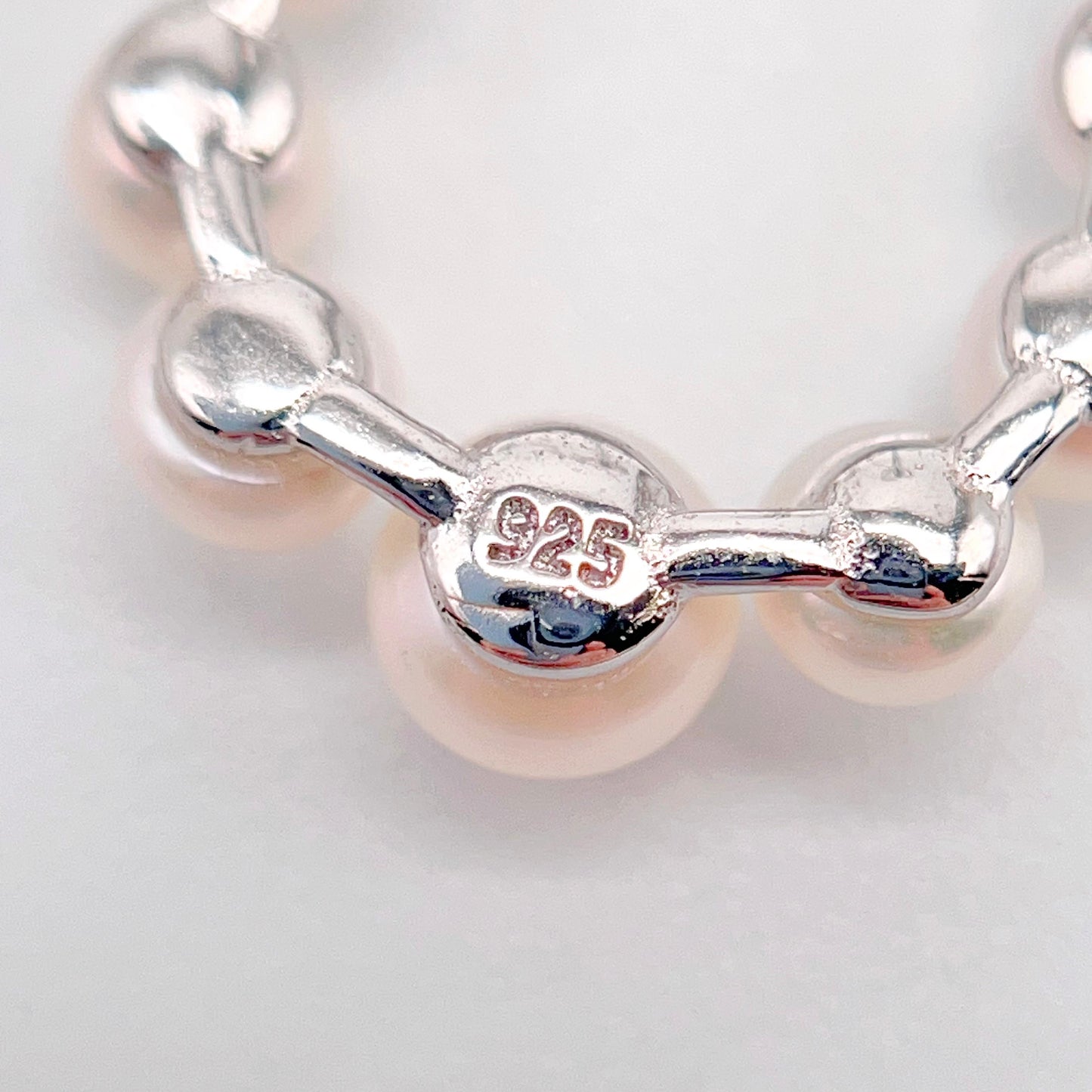 Retro Wind. Pearl Earring and Ring set in Silver 925. Bow & Swing