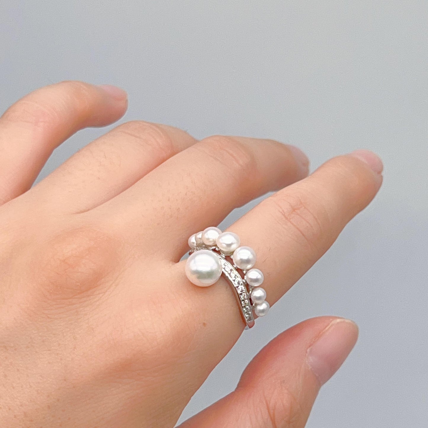 Retro Wind. Pearl Earring and Ring set in Silver 925. Bow & Swing