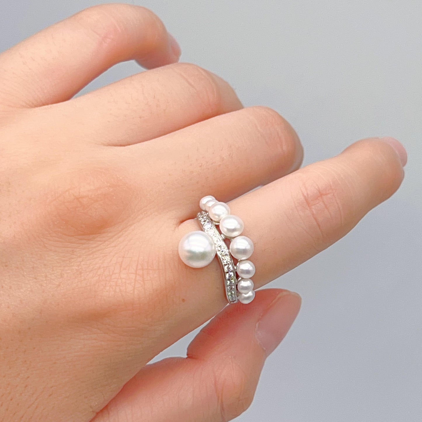 Retro Wind. Pearl Earring and Ring set in Silver 925. Bow & Swing