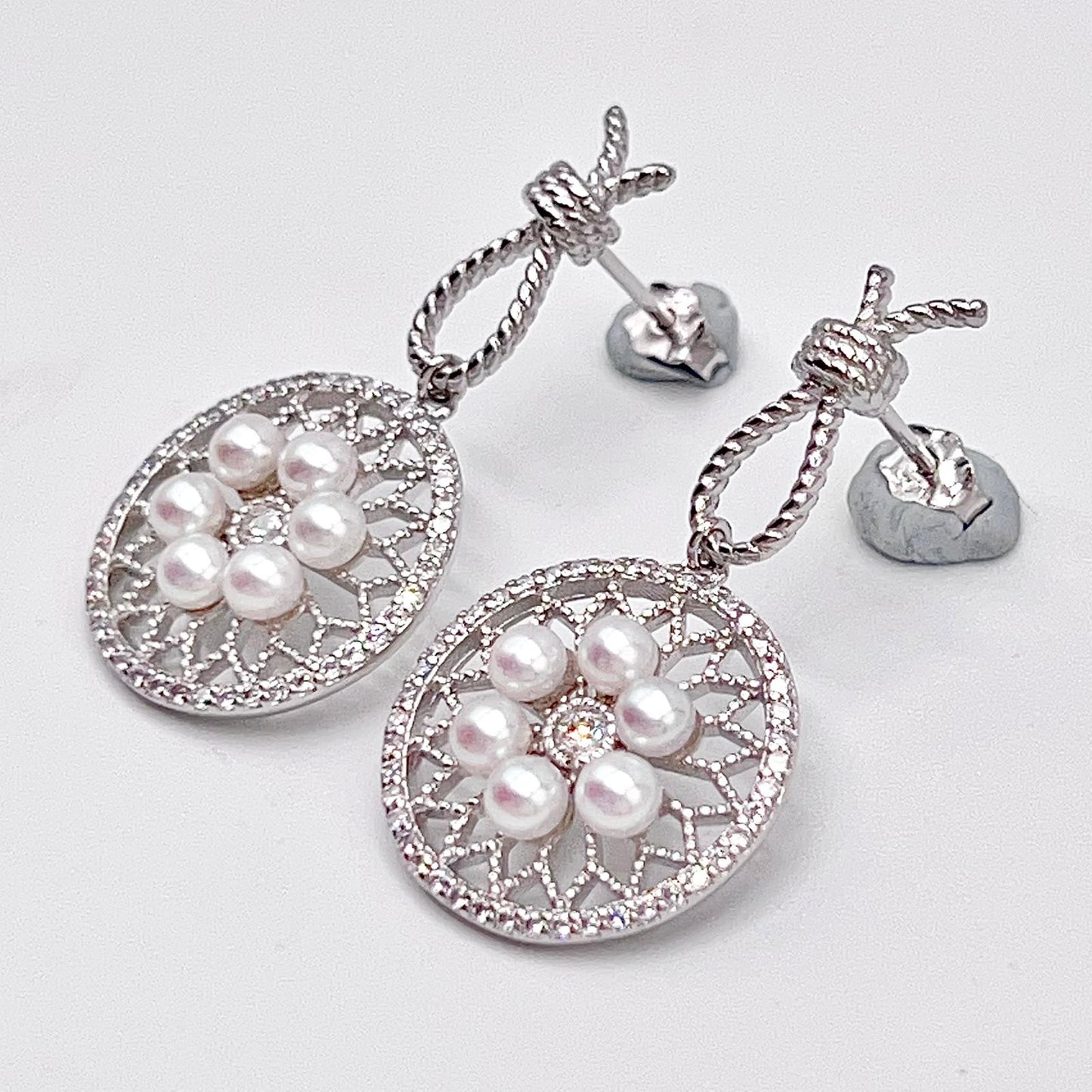 Retro Wind. Pearl Earring and Ring in Silver 925. Wheel