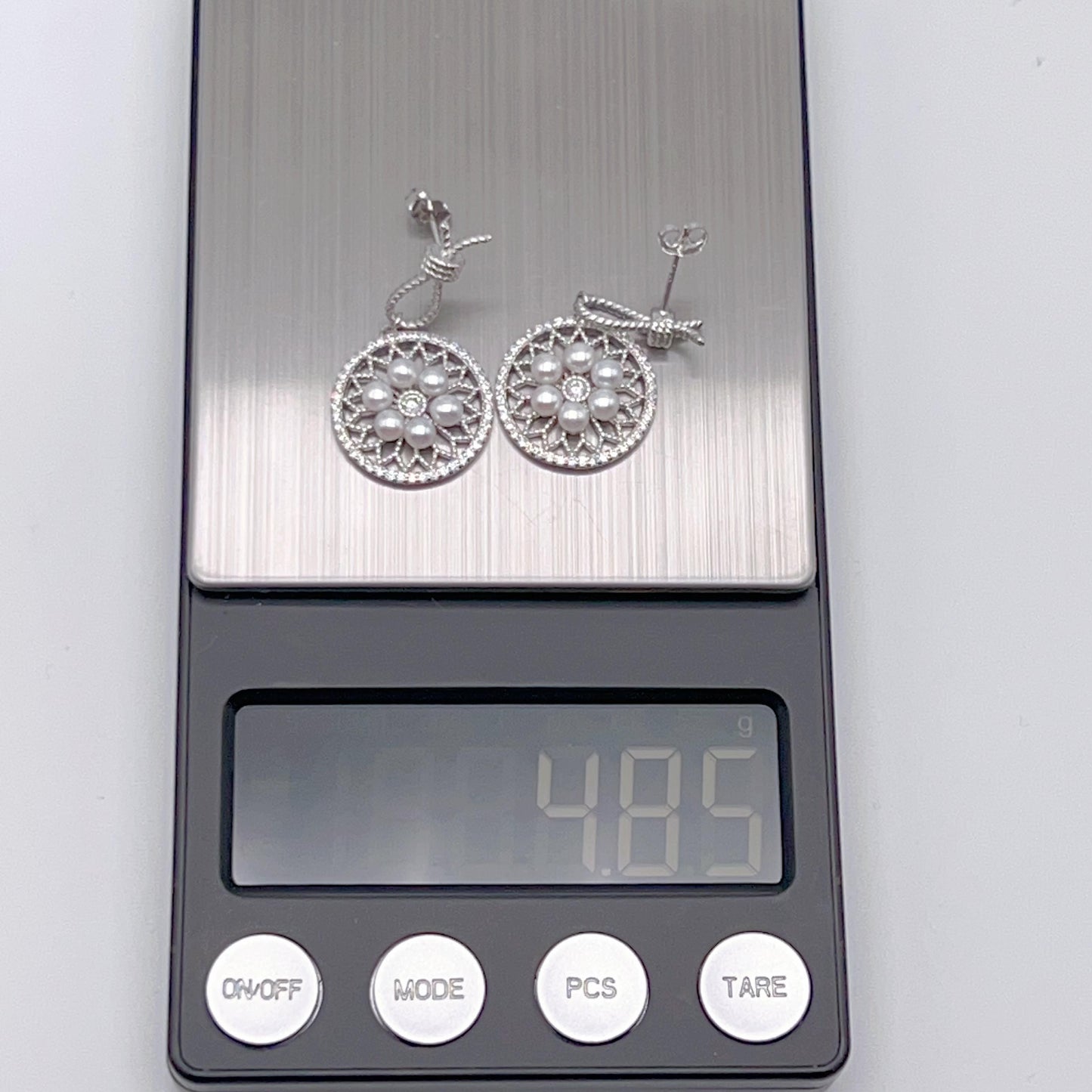 Retro Wind. Pearl Earring and Ring in Silver 925. Wheel