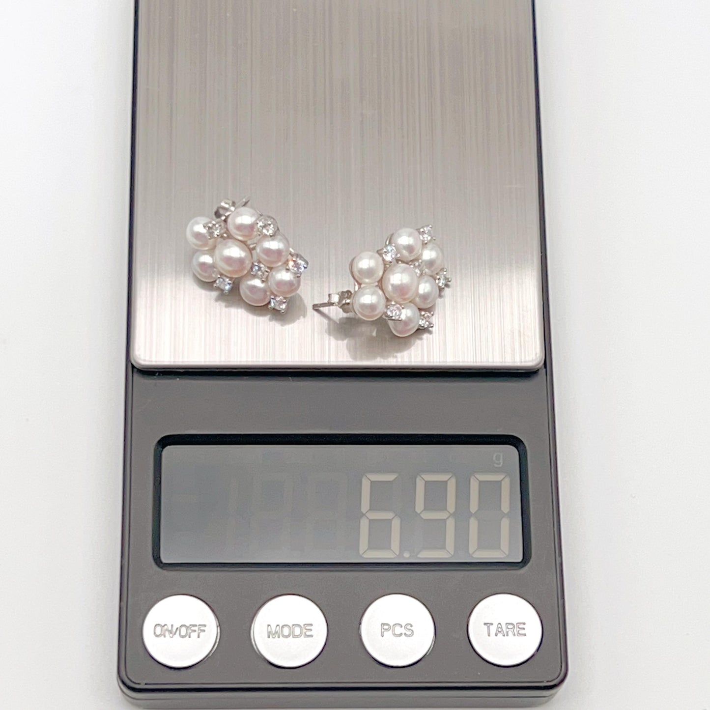 Retro Wind. Pearl Earring and Ring in Silver 925. Cloud Cluster