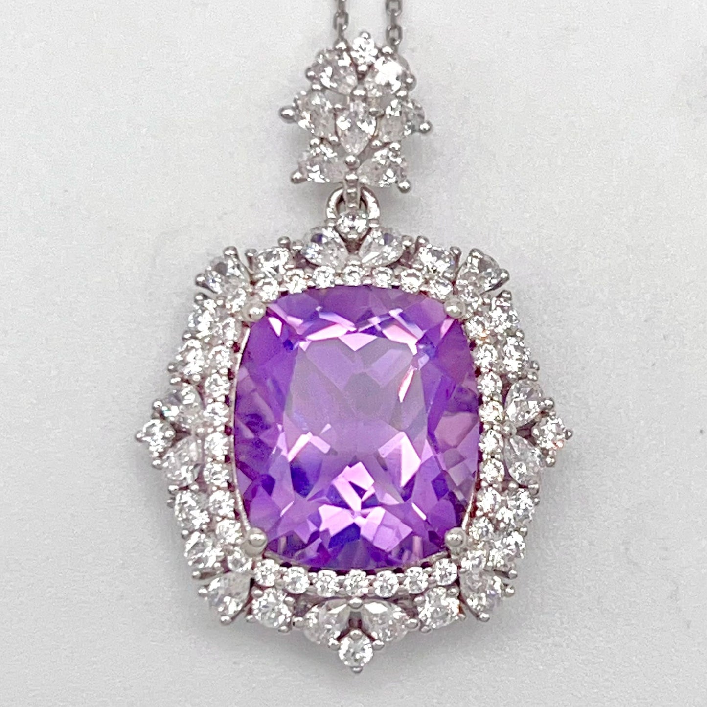 Regal Cushion-Cut Amethyst and Zirconia Halo Pendant Necklace