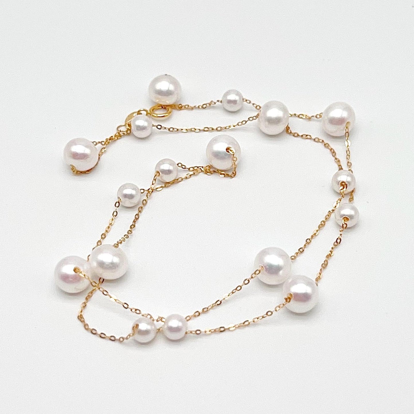 Starlight. 4-7mmWhite Pearl Necklace in 18K Gold