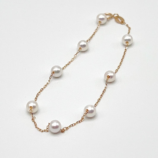 Starlight. White Pearl bracelet in 18K Gold. 4mm