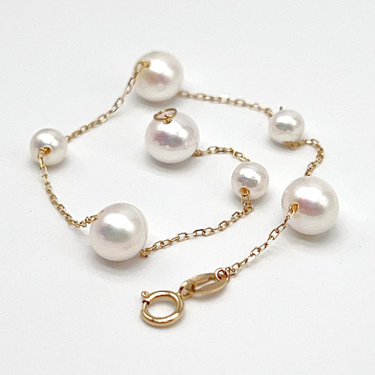 Starlight . White Pearl bracelet in 18K Gold. 4-7mm