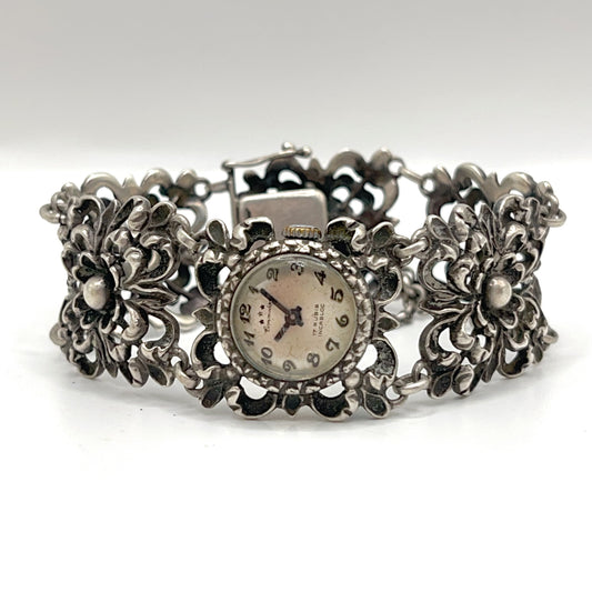 Vintage . Handmade Watch in Silver 800 with Floral Sculpture Belt. Manual