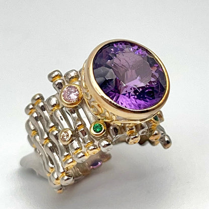 Retro Wind. Ring of Amethyst in Silver. Round Multi-color Zircon