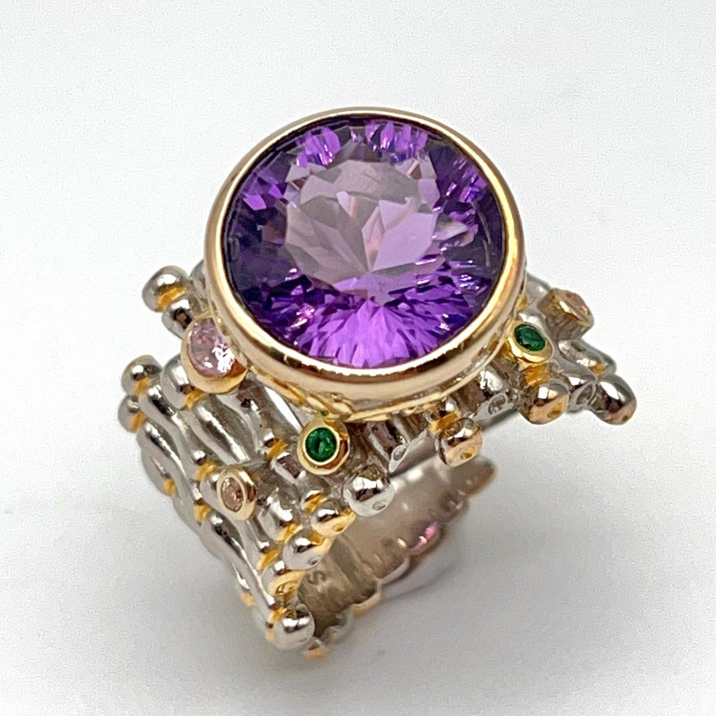 Retro Wind. Ring of Amethyst in Silver. Round Multi-color Zircon
