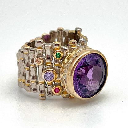 Retro Wind. Ring of Amethyst in Silver. Round Multi-color Zircon