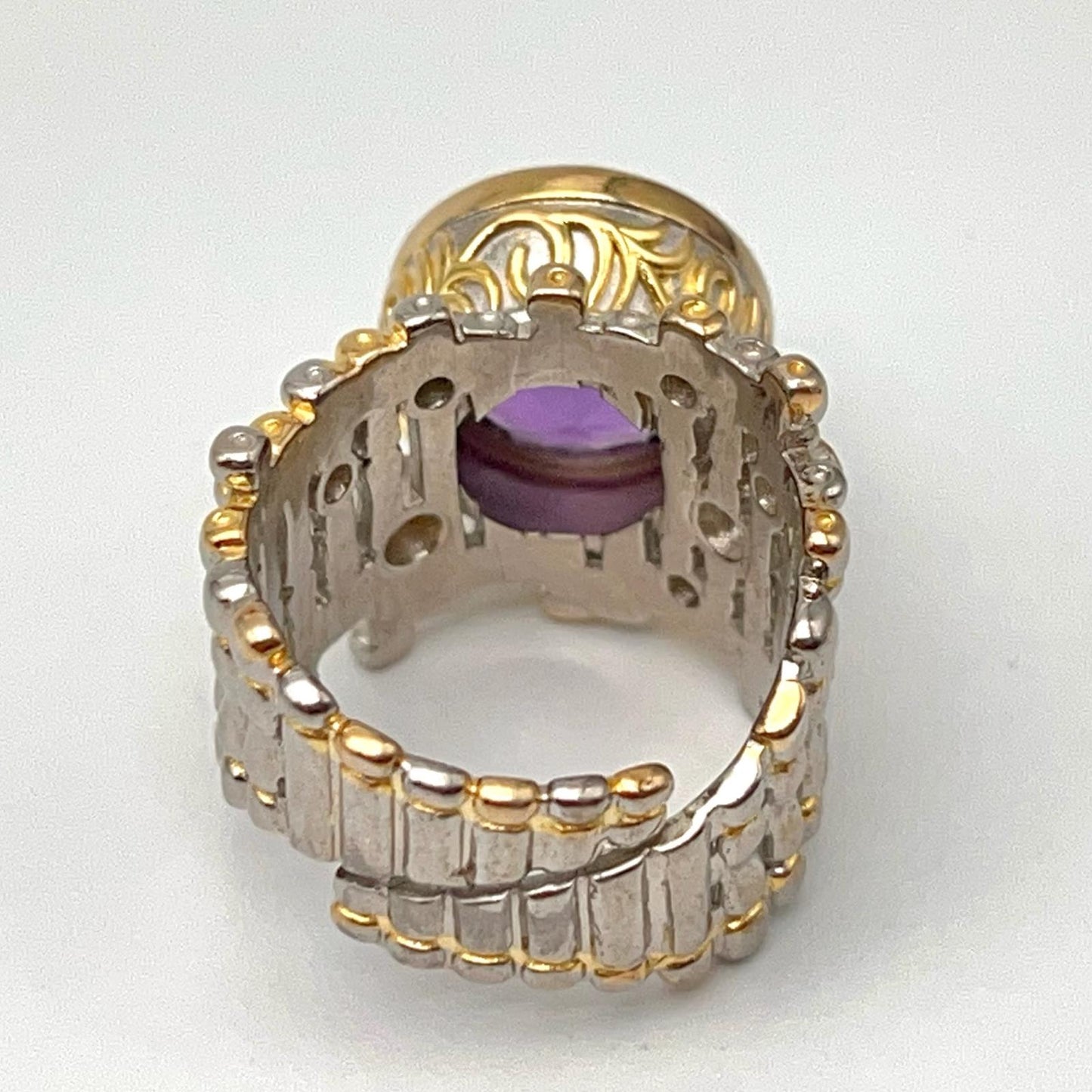 Retro Wind. Ring of Amethyst in Silver. Round Multi-color Zircon