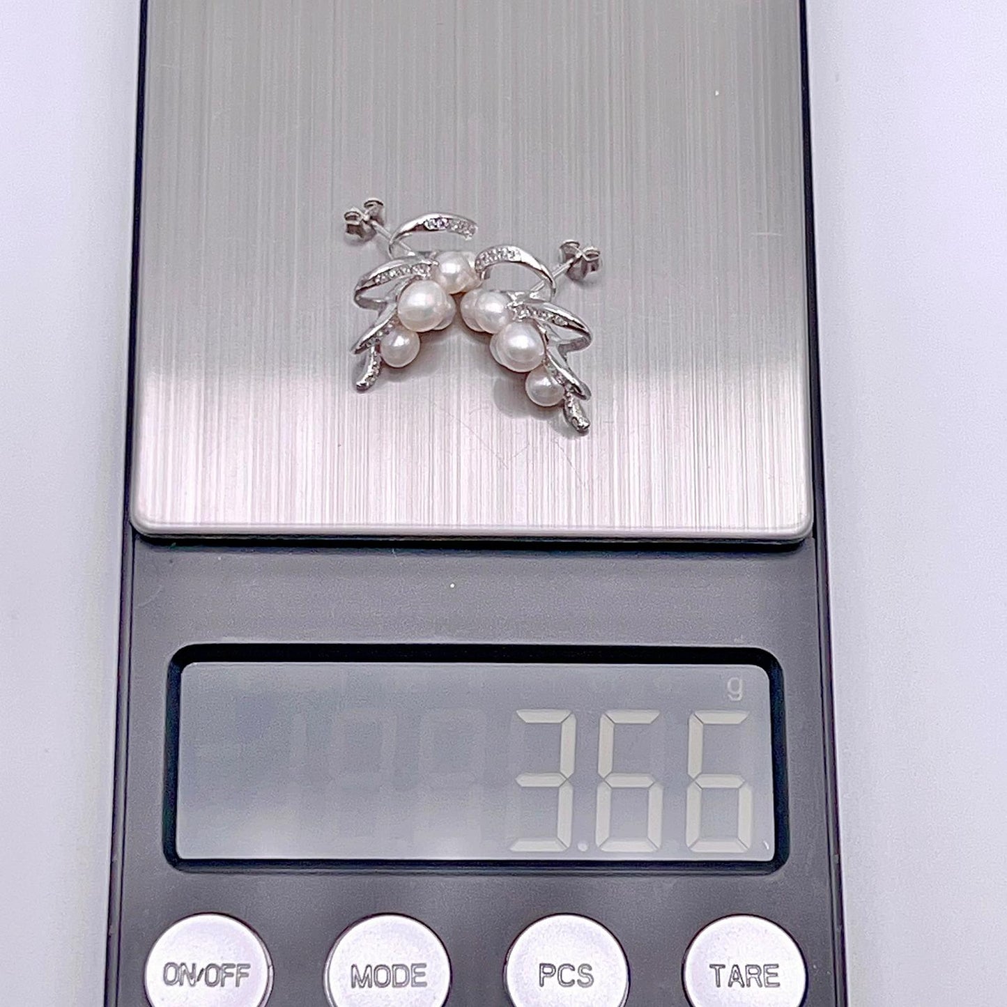 Antique Impression. Multi-pearl Ring and Earring Set in Silver 925. Ribbon & Snowball