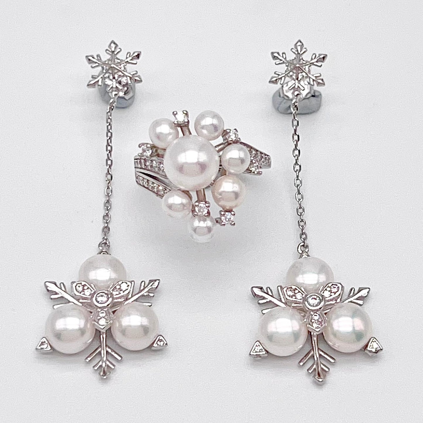Contemporary Cocktail. Earring and Ring of Pearl Set in Silver 925. Triangular Snowflake