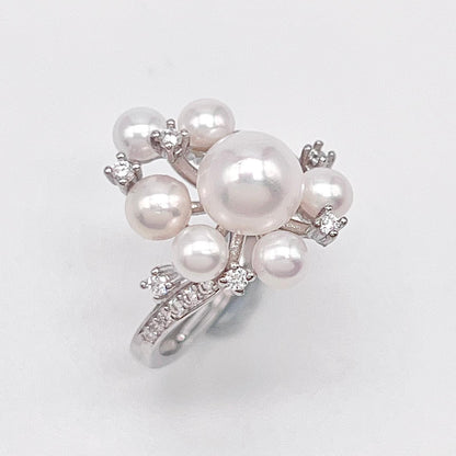 Contemporary Cocktail. Earring and Ring of Pearl Set in Silver 925. Triangular Snowflake