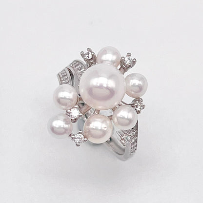 Contemporary Cocktail. Earring and Ring of Pearl Set in Silver 925. Triangular Snowflake