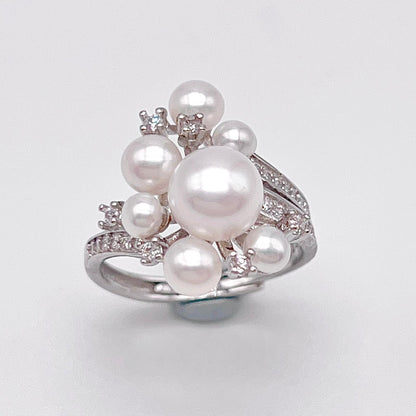 Contemporary Cocktail. Earring and Ring of Pearl Set in Silver 925. Triangular Snowflake