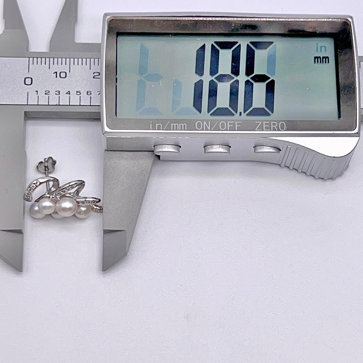 Contemporary Cocktail. Earring and Ring of Pearl Set in Silver 925. Triangular Snowflake