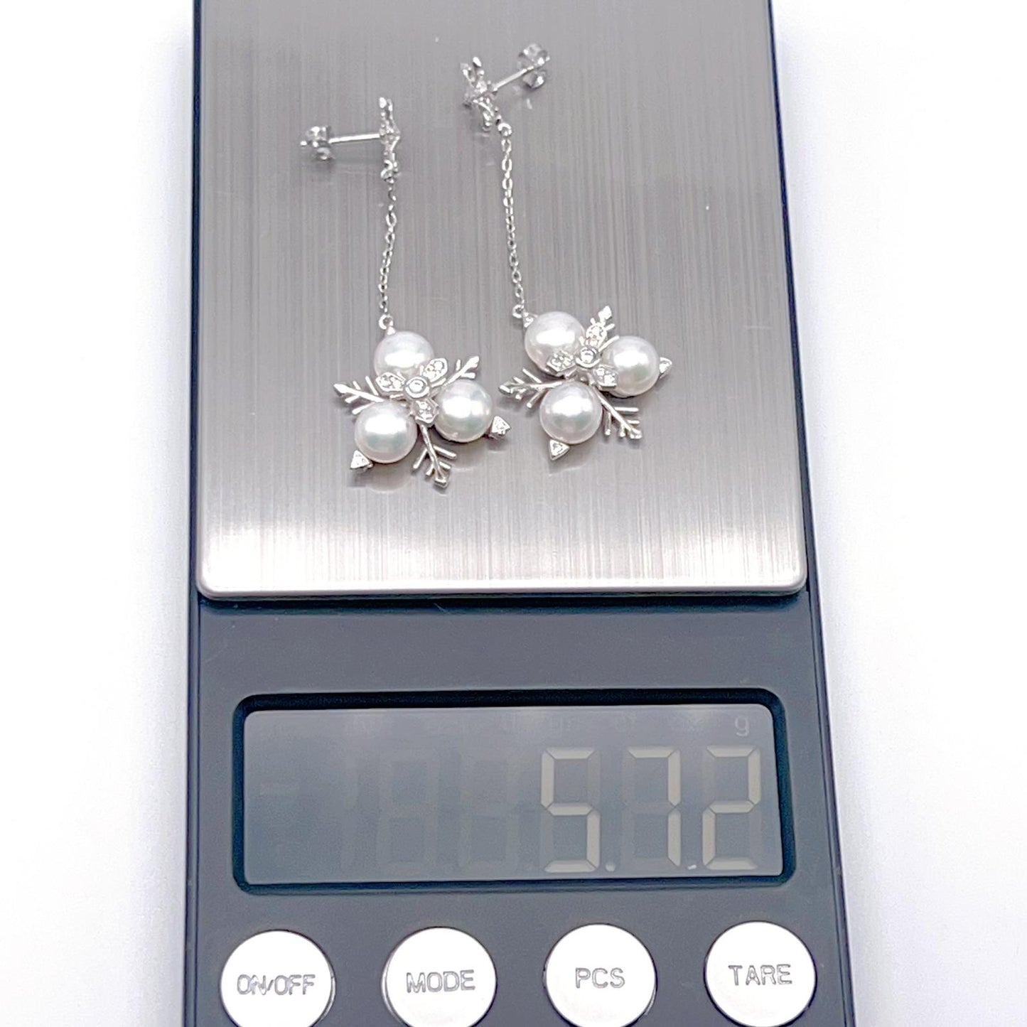 Contemporary Cocktail. Earring and Ring of Pearl Set in Silver 925. Triangular Snowflake