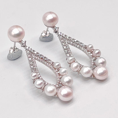 Retro Wind. Freshwater Pearl Earring and ring Set in silver 925. 5 pearl swing & crown ring