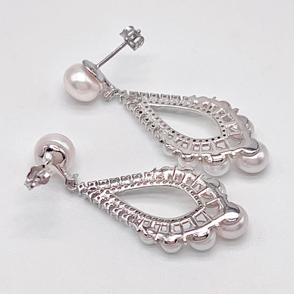 Retro Wind. Freshwater Pearl Earring and ring Set in silver 925. 5 pearl swing & crown ring