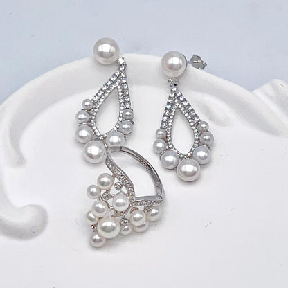 Retro Wind. Freshwater Pearl Earring and ring Set in silver 925. 5 pearl swing & crown ring
