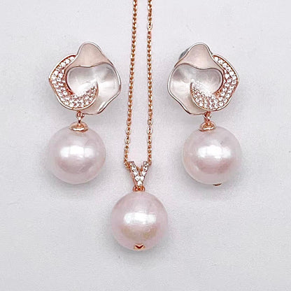 Retro Wind. Freshwater Pearl Earring and pendant Set in silver 925. Silver Flower