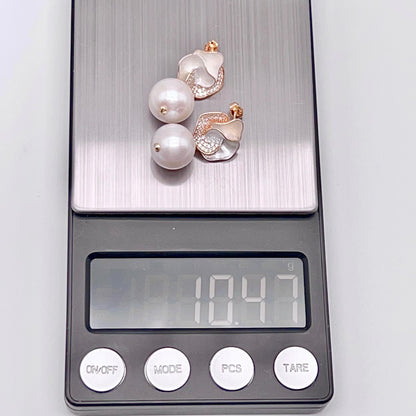Retro Wind. Freshwater Pearl Earring and pendant Set in silver 925. Silver Flower