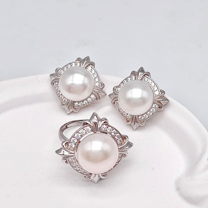 Retro Wind. Pearl Earring and Ring set in Silver 925. 4 Iris Frame