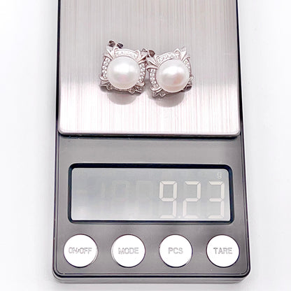 Retro Wind. Pearl Earring and Ring set in Silver 925. 4 Iris Frame