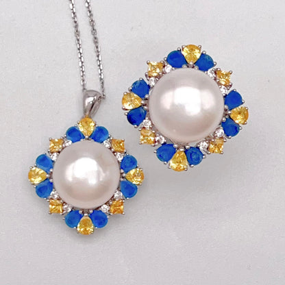 Retro Wind. Pearl Ring and Pendant set in Silver 925. Blue yellow Zircon