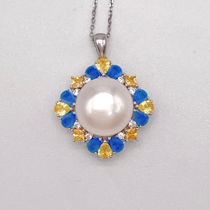 Retro Wind. Pearl Ring and Pendant set in Silver 925. Blue yellow Zircon