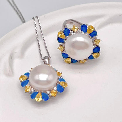 Retro Wind. Pearl Ring and Pendant set in Silver 925. Blue yellow Zircon