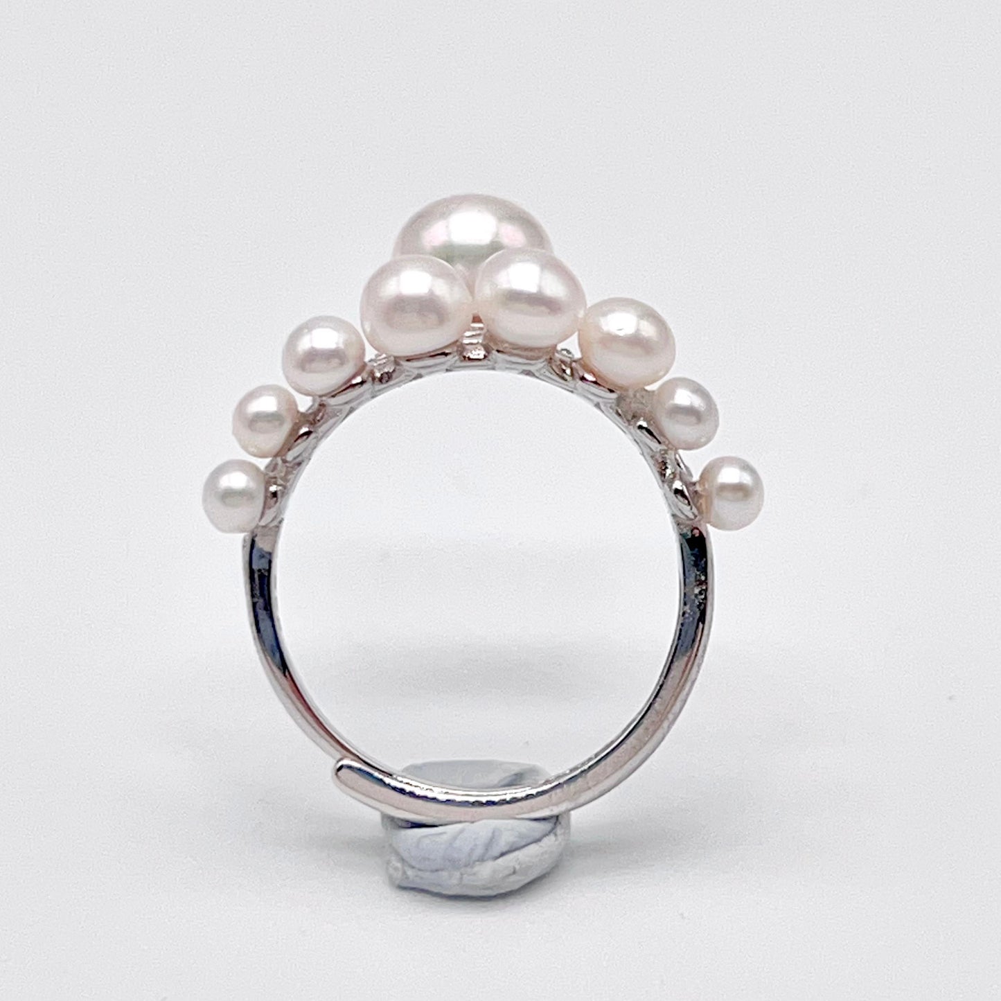 Retro Wind. Pearl Earring and Ring set in Silver 925. Bow & Swing