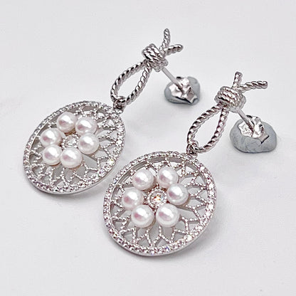Retro Wind. Pearl Earring and Ring in Silver 925. Wheel